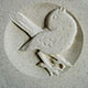 Bird design carved in Portland stone