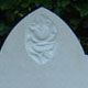 Headstone with hand-carved rose in Nabresina