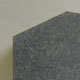 Offset peon top headstone in honed Dark Grey granite